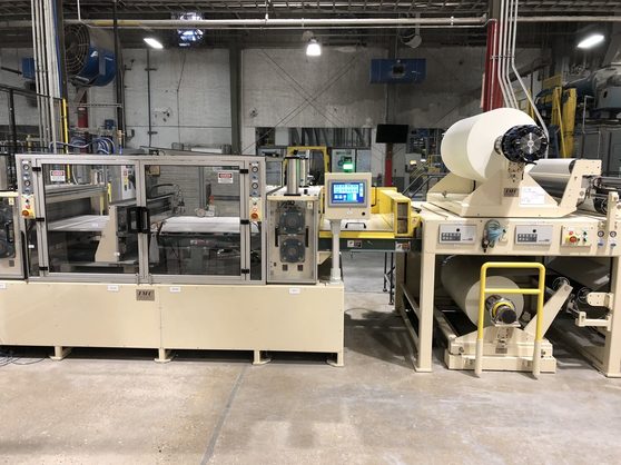 IMC laminating line with cutter, heater, and nip sections